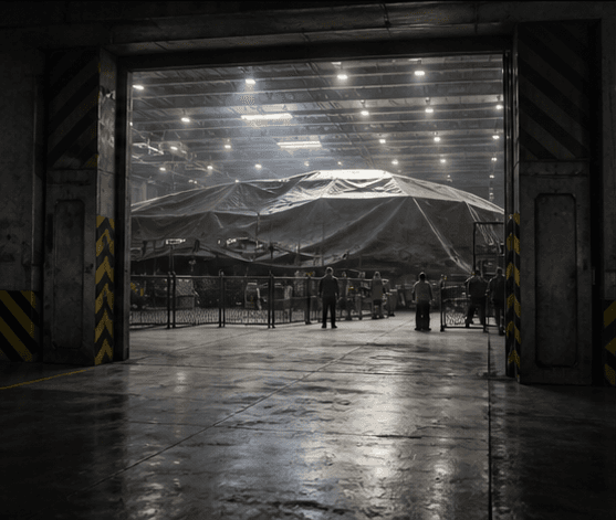 Editorial illustration of a compartmented underground aerospace hangar and a shrouded unfamiliar airframe.